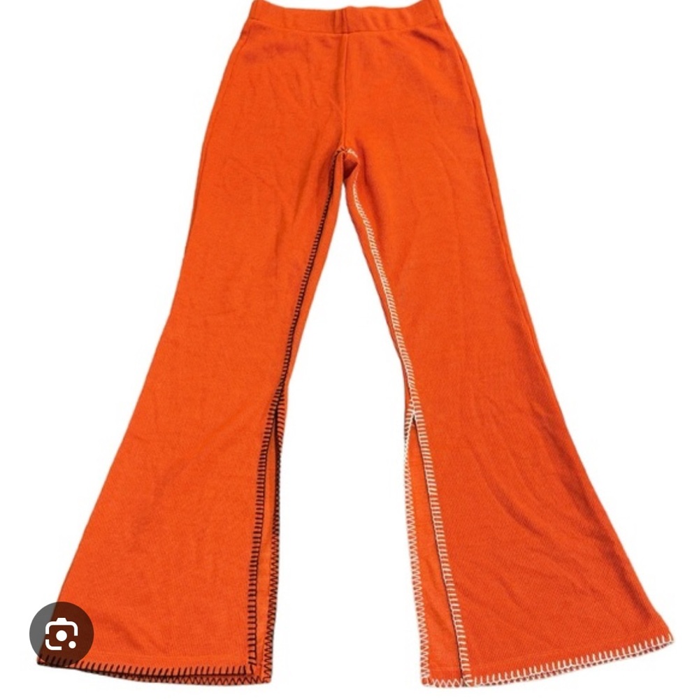 Vibrant Orange Flared Knit Pants from ANIM
